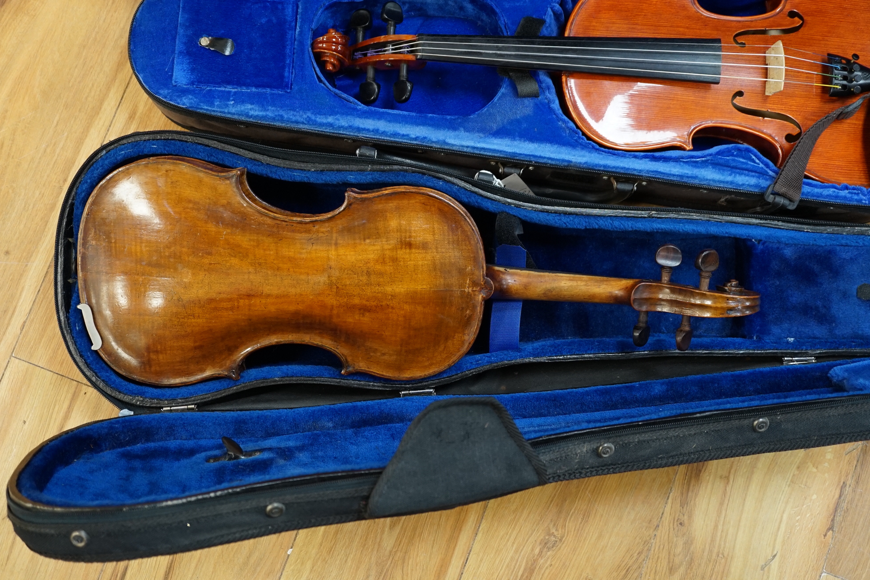 A 19th century English violin, bears hand written paper label, a modern Stentor violin and a metronome